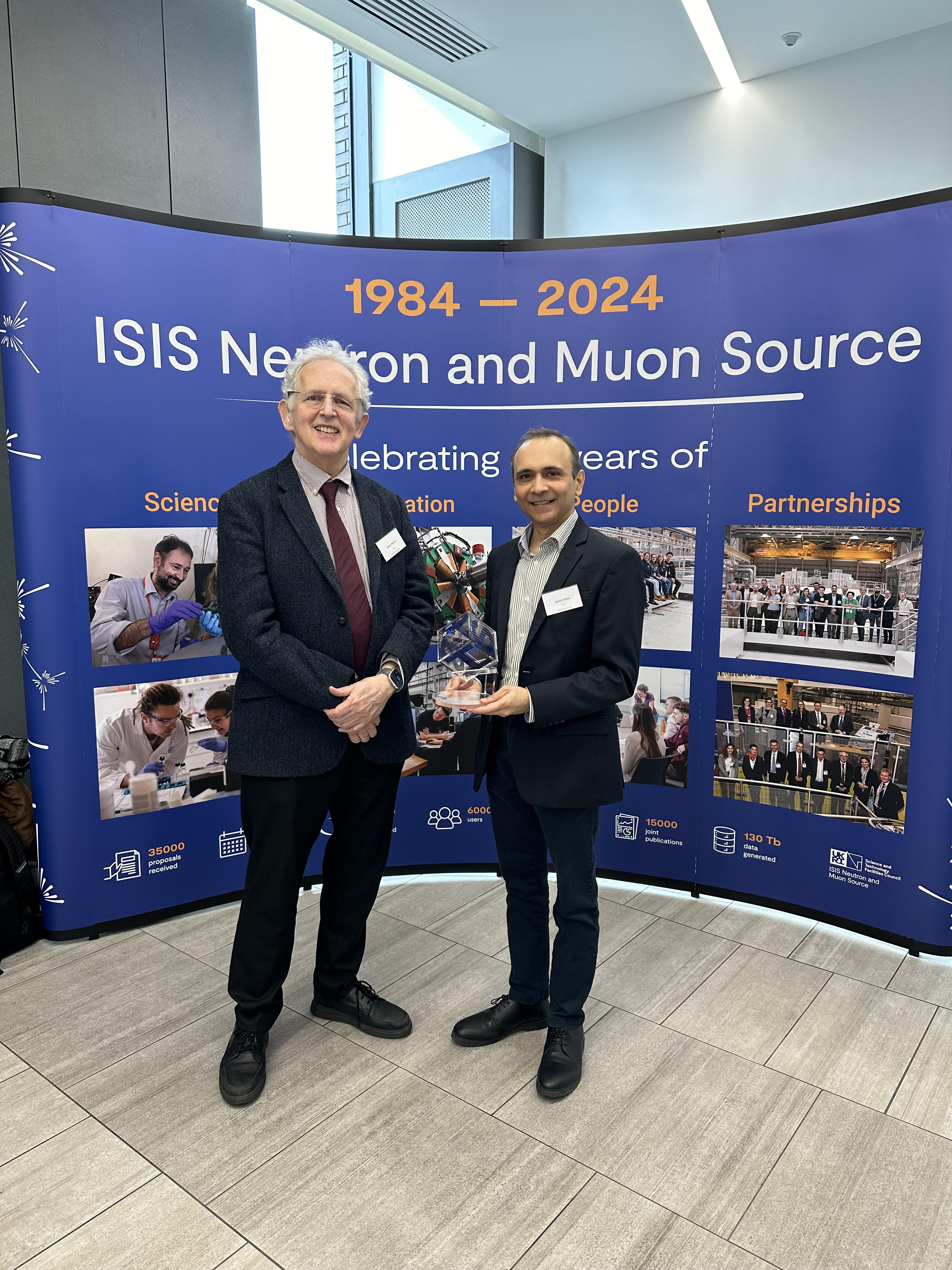 Jayesh and Steve holding the award